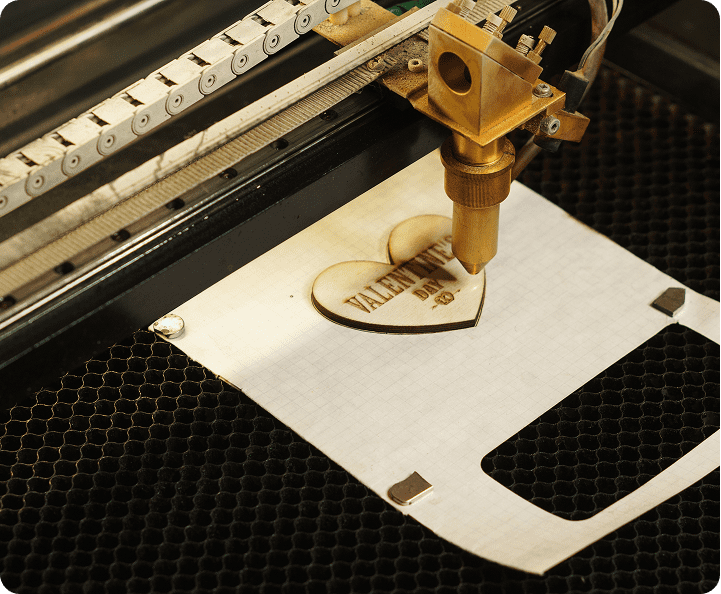 Heart engraving on paper using laser